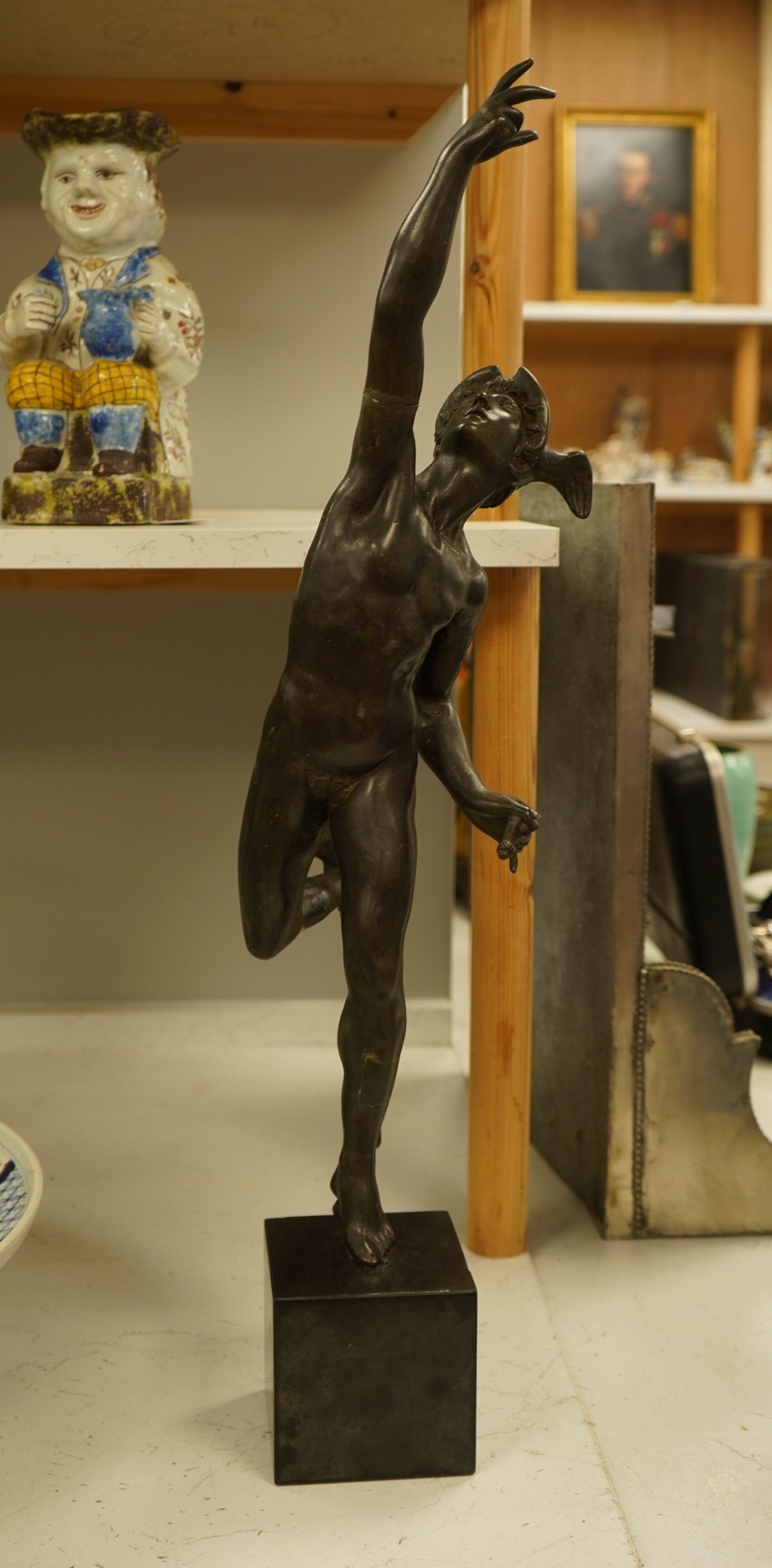 After the antique, a bronze study of Mercury raised on square base, 70cm high